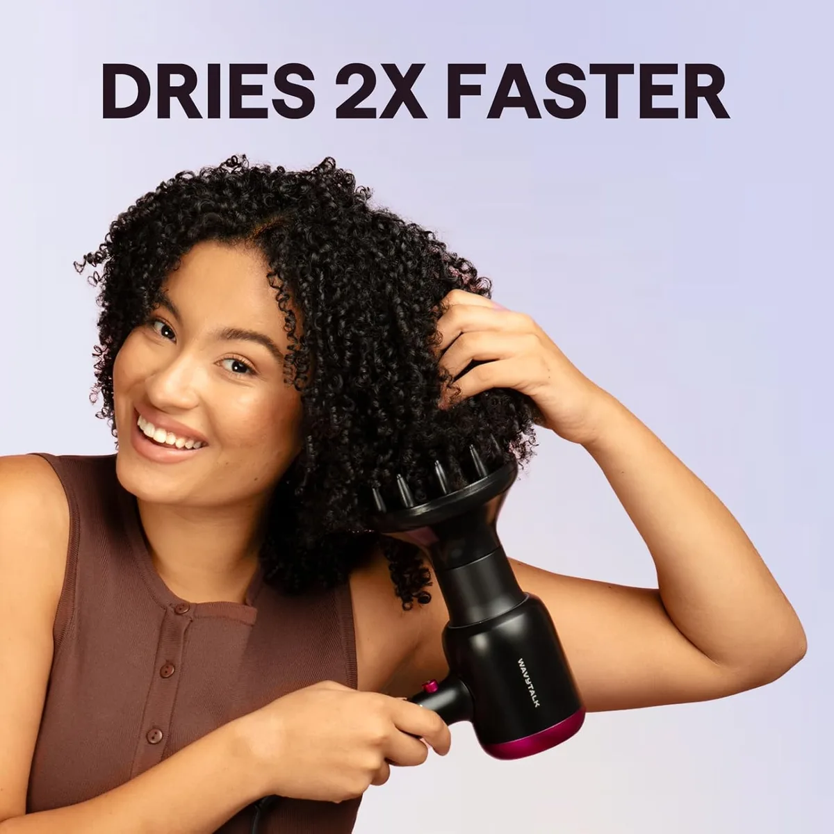 woman drying natural curls with the ionic hair dryer diffuser attachment