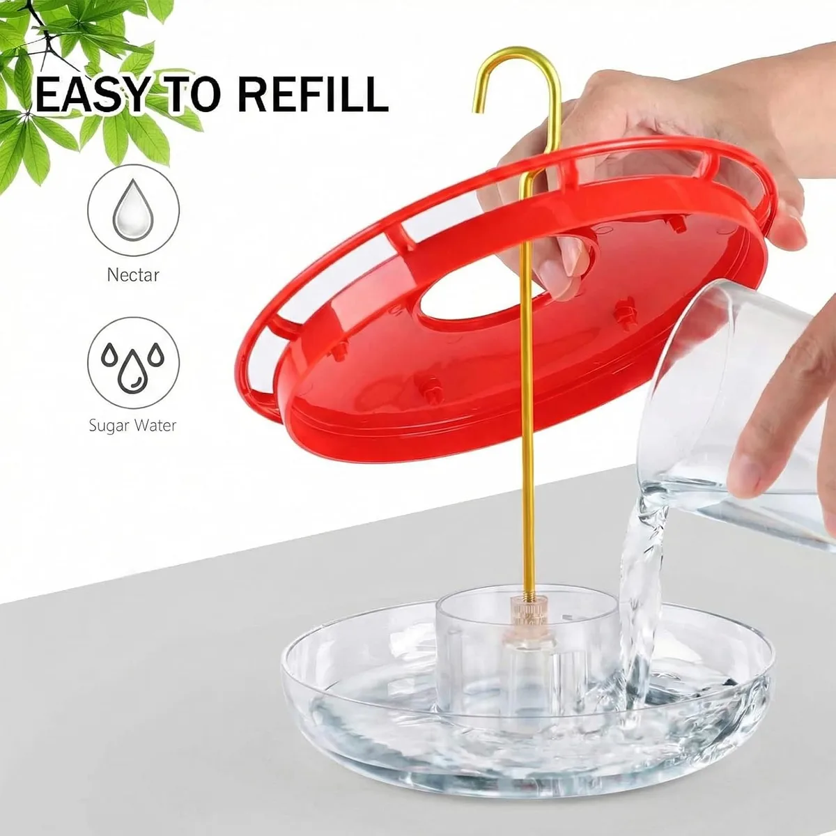 refilling the saucer hummingbird feeder