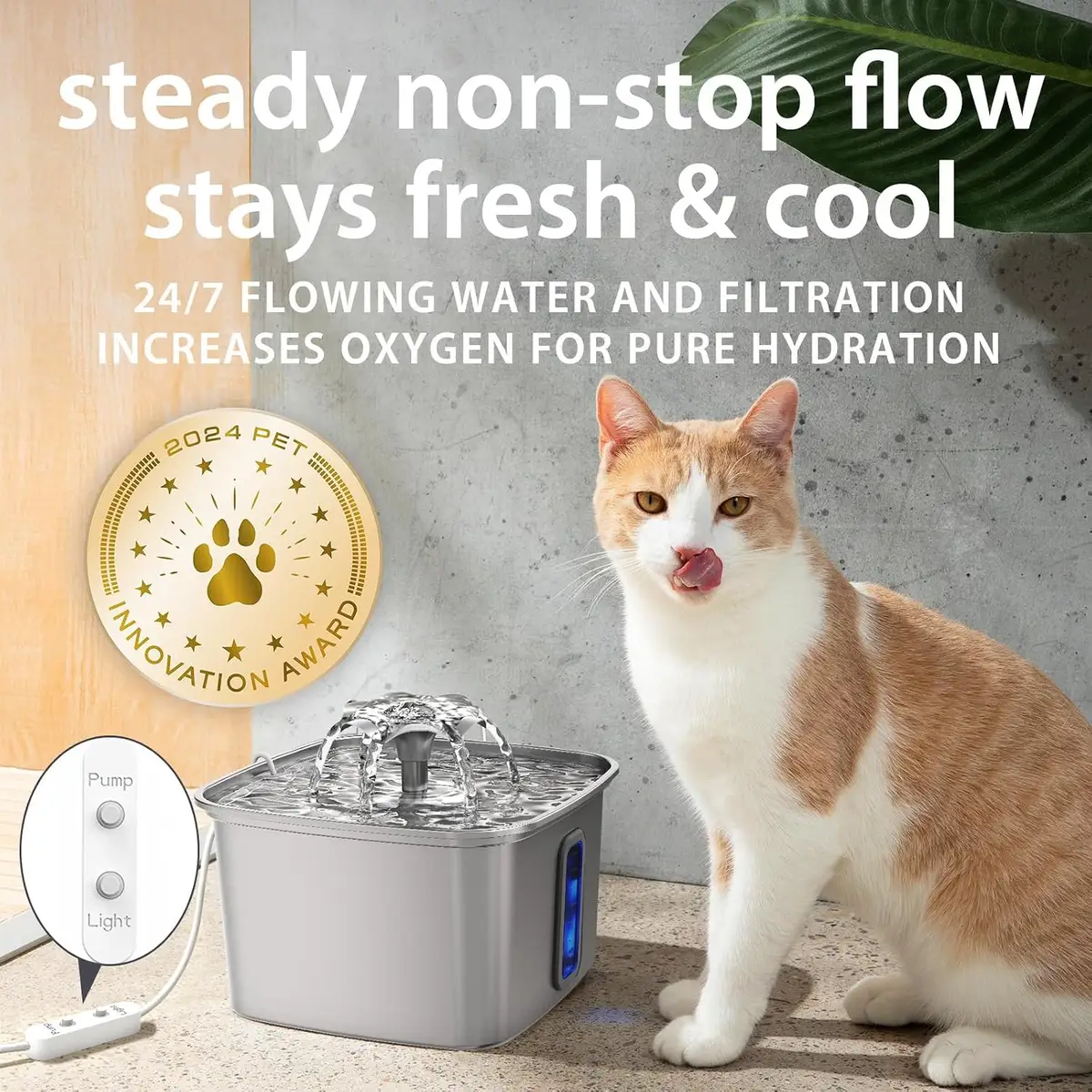 cat drinking from the stainless steel water fountain