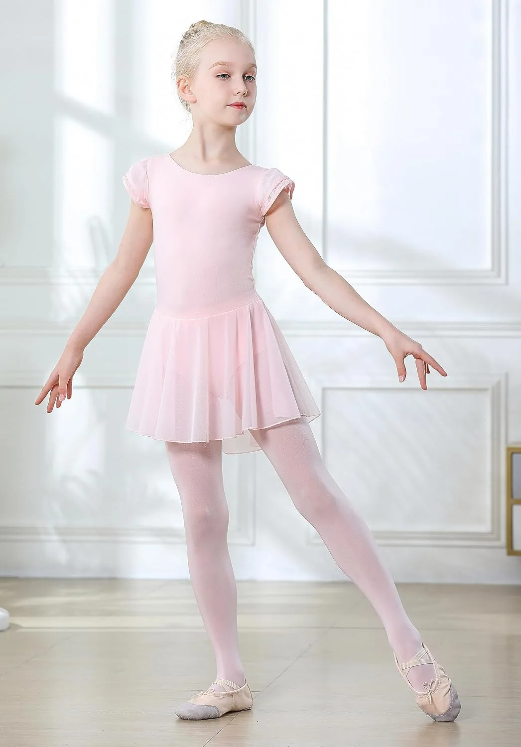girl dancing in the ballet leotard with skirt