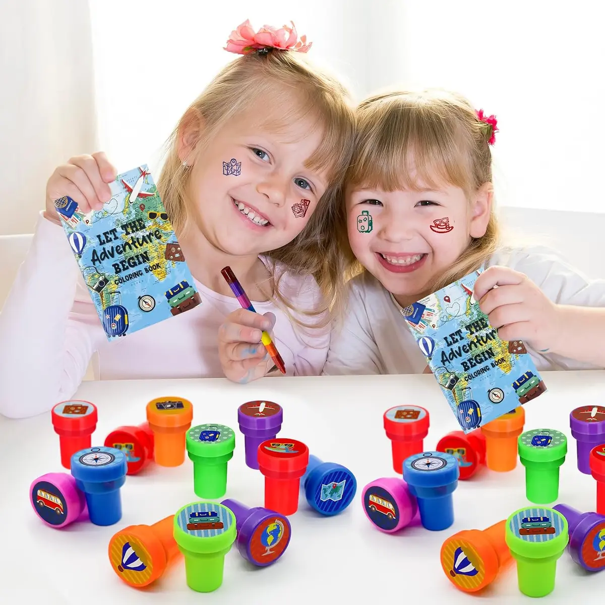 kids sharing self-inking stampers as party favors
