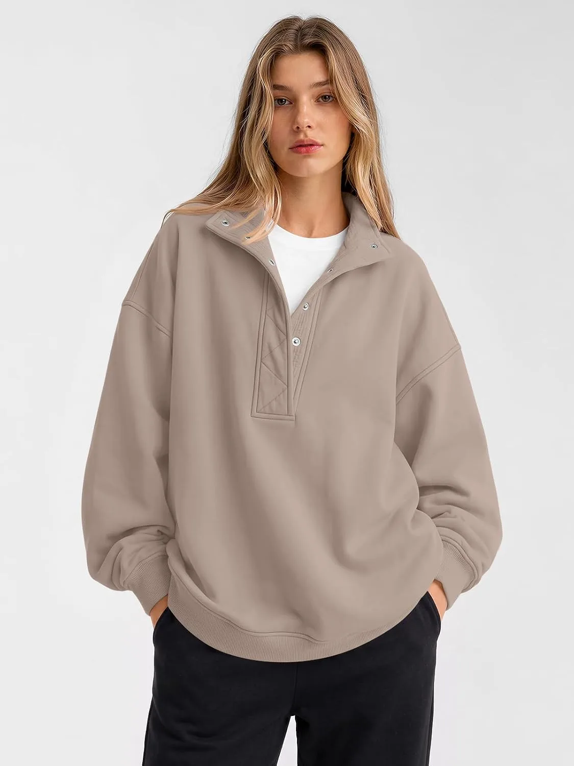 snap button henley collar on the sweatshirt