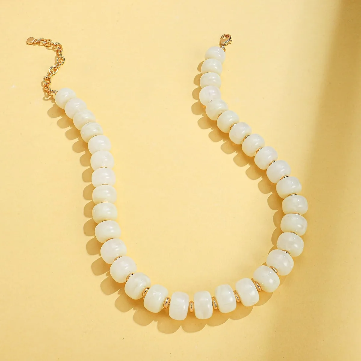 clasp and chain of the chunky beaded necklace